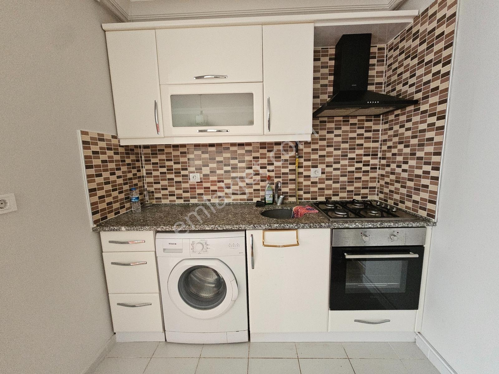 Körfez'de Tramvay Durağında Eşyalı Kiracılı Satılık 1+1 Daire - Görsel 13