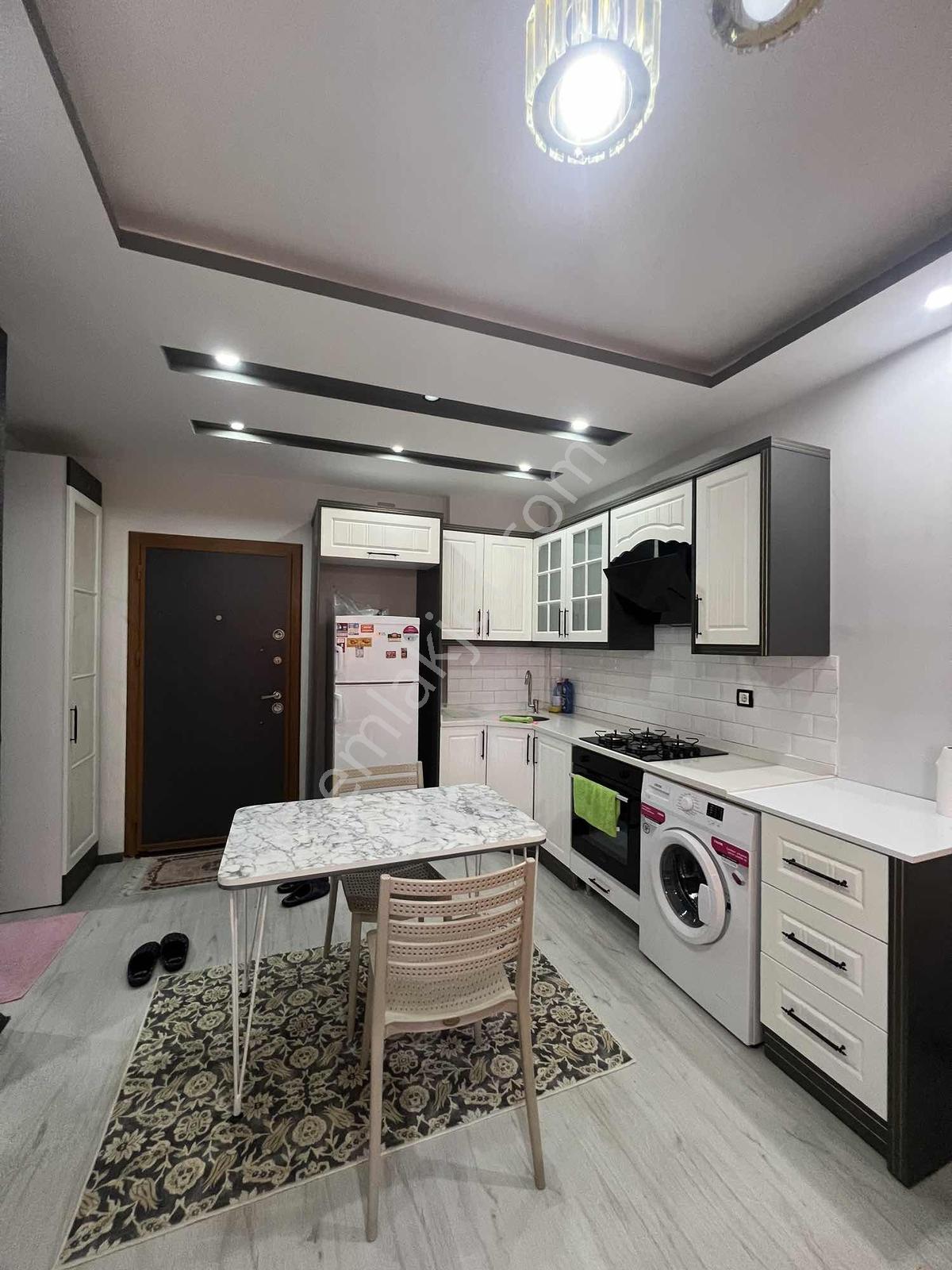 Kulepark~ayrıcalığı~ile1+1eşyalı~bulvar~üzeri~50~m2lüks~balkonlu
