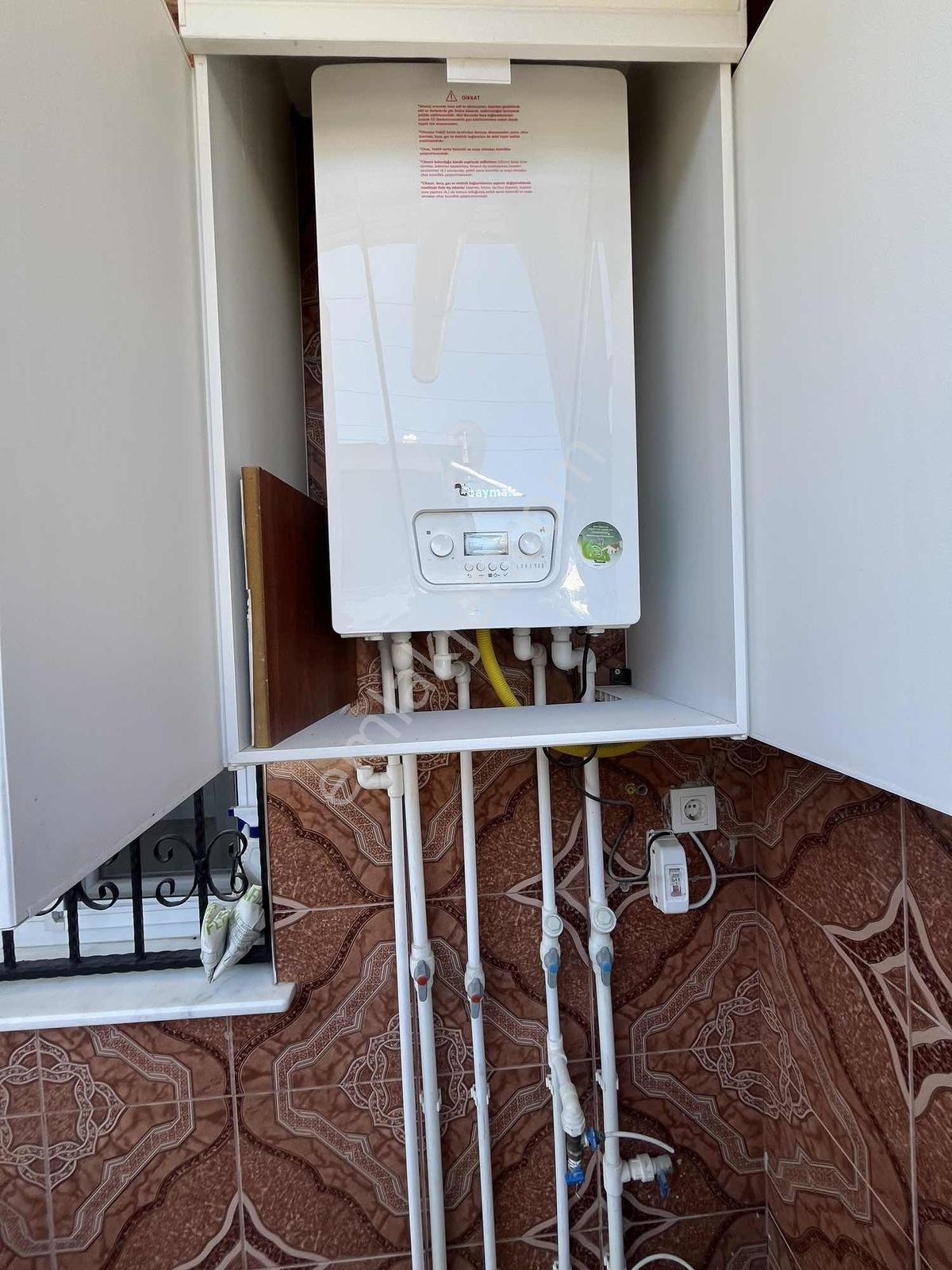 Bornova Naldökende Doğalgazlı Klimalı Kapalı Mutfaklı 2+1 Daire - Görsel 17