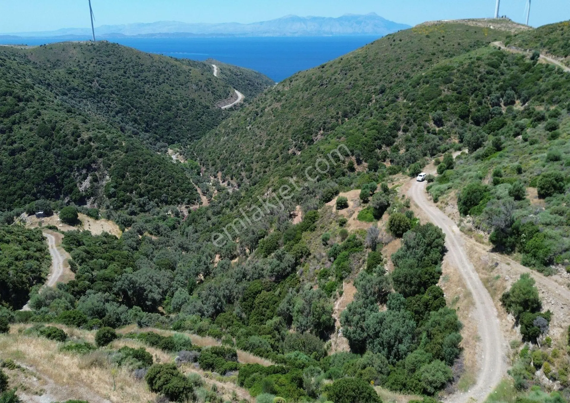 Sarpıncık'ta Deniz Manzaralı 7312 M² Yatırımlık Arazi