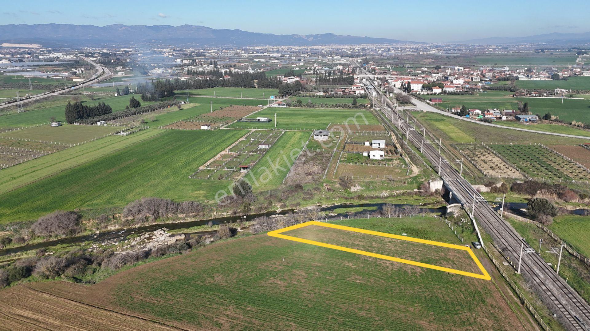 İzmir Menderes Develide 1805 M2 Hisse Tapulu Taksimli Yolu Var
