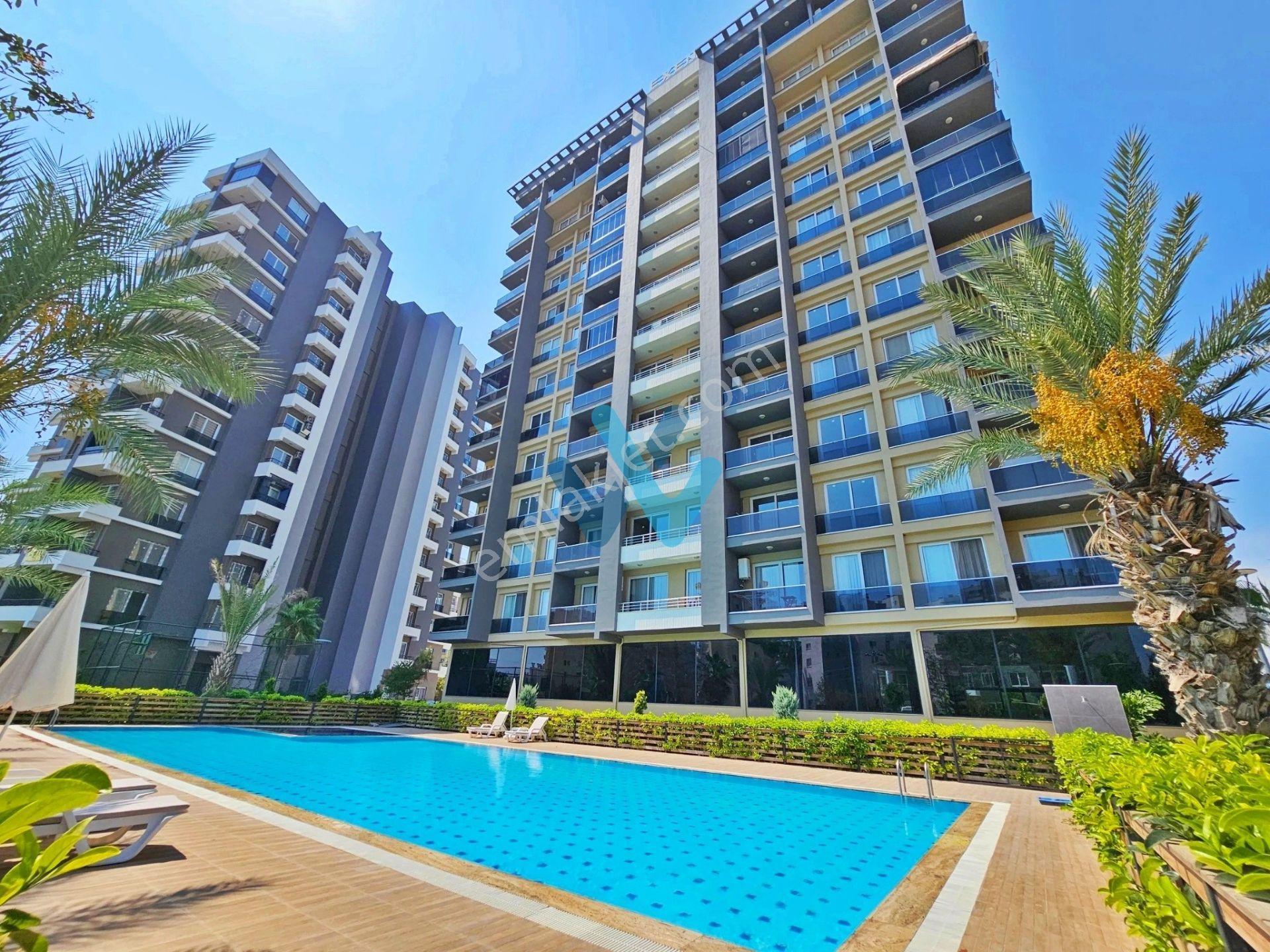 Wın'den Dora Exxen'de Deniz Manzaralı Satılık Geniş 1+1 Daire