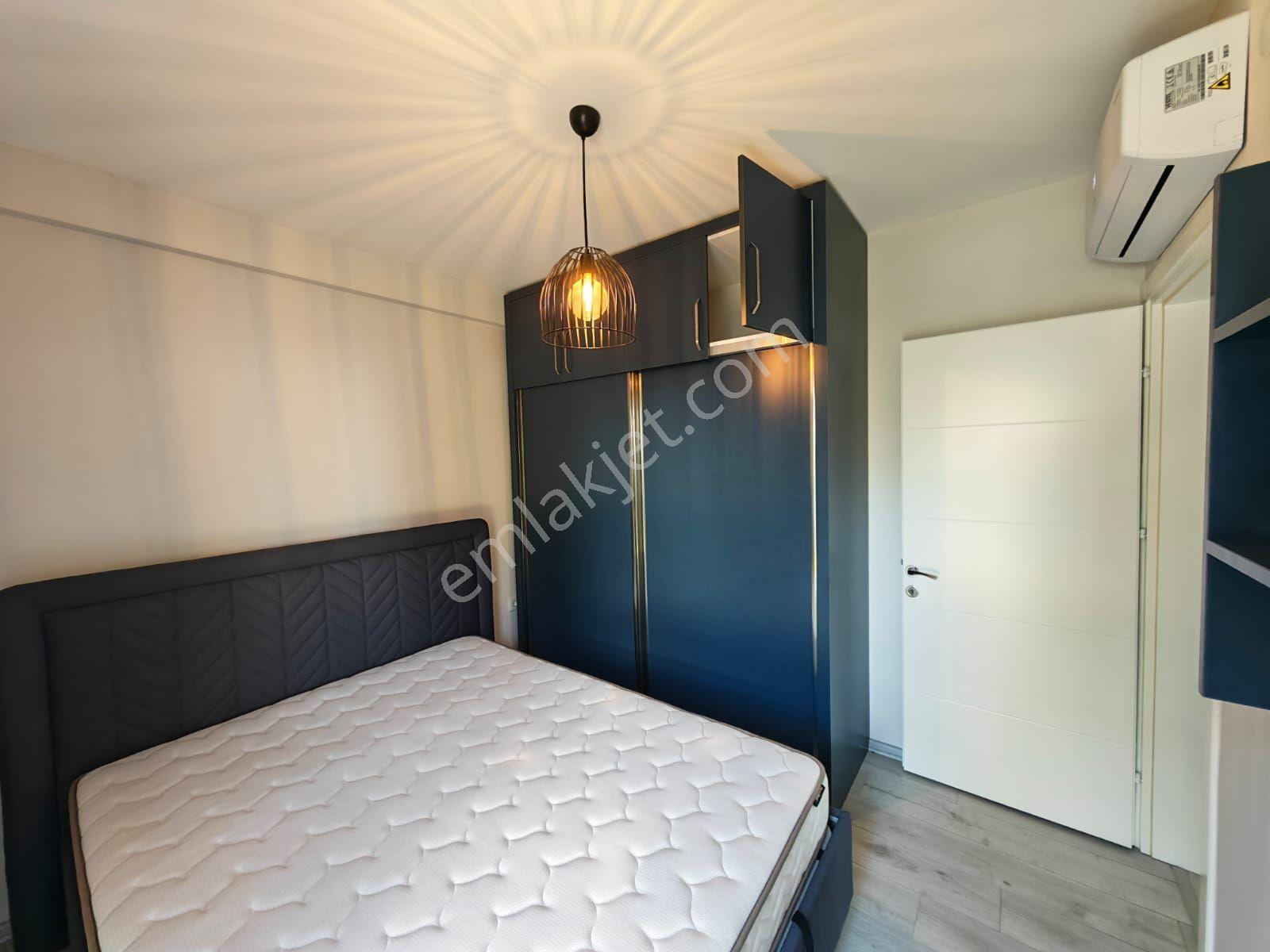 Kadınlar Denizi Mahallesi Havuz Manzaralı Bahçeli Eşyalı Kiralık 2+1 Daire - Görsel 12