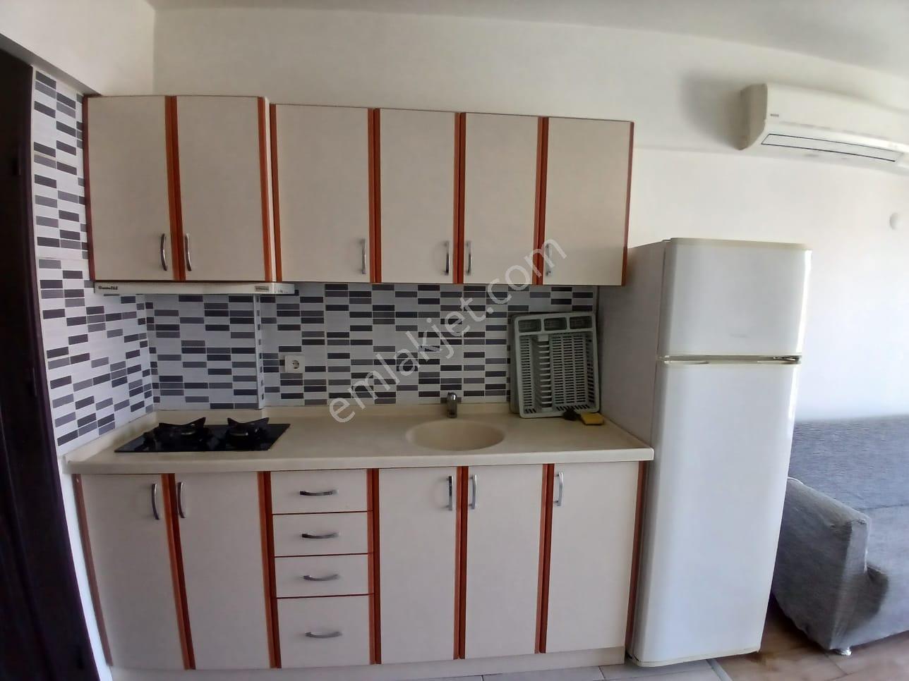 Ender Uysal Gayrimenkulden Asmalıevlerde Klimalı Balkonlu 1+1 Kiralık Apart...