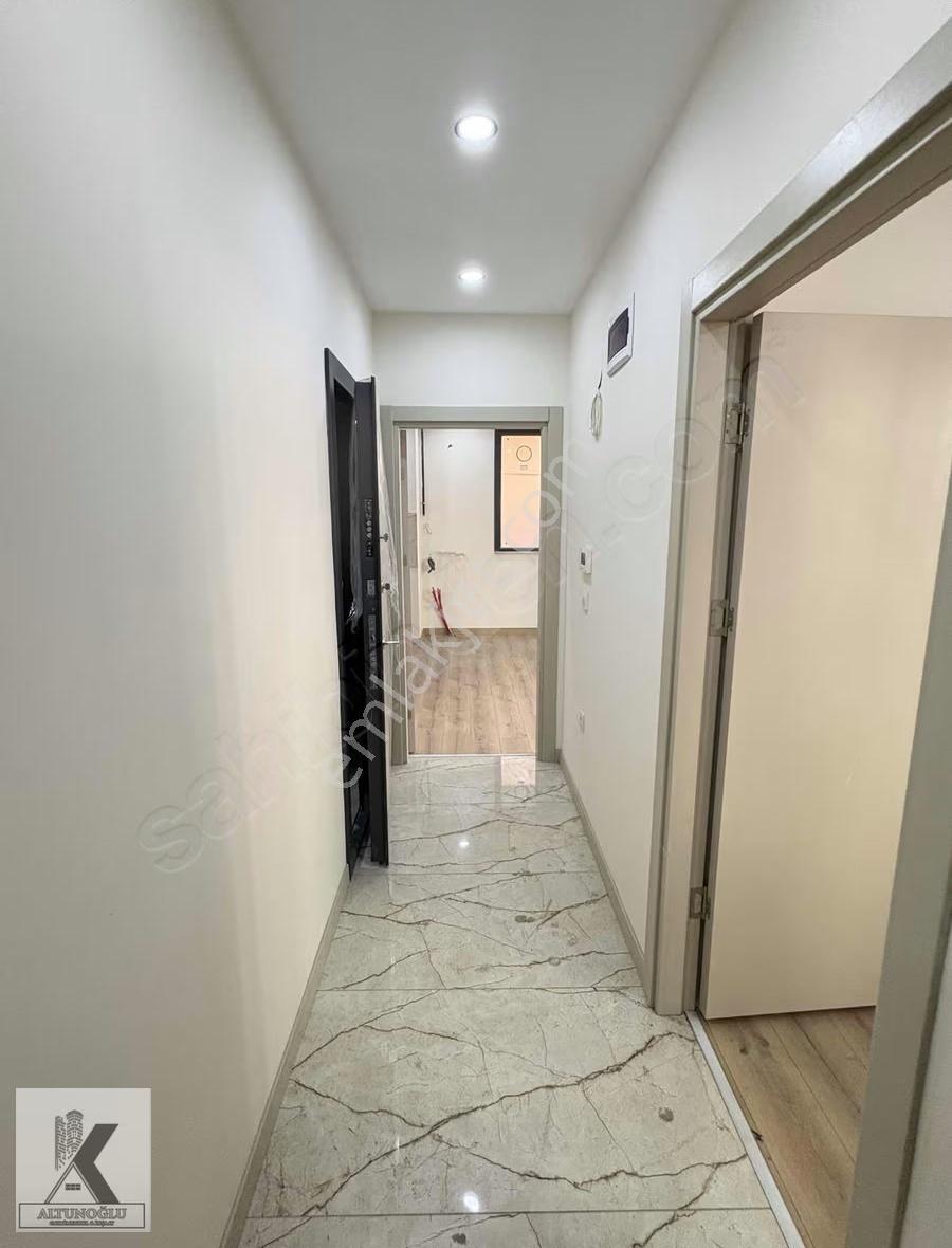 Altunoğlu"ndan Cadde Ulaşım Yakınında 1+1 Sıfır Ara Kat Daire - Görsel 14