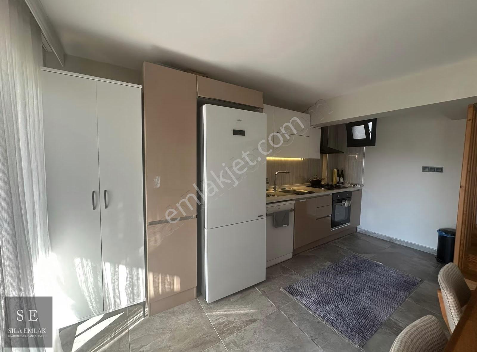 Sıla Emlak'tan Güllük'te 2+1 Bahçe Dubleksi Kiralık Daire