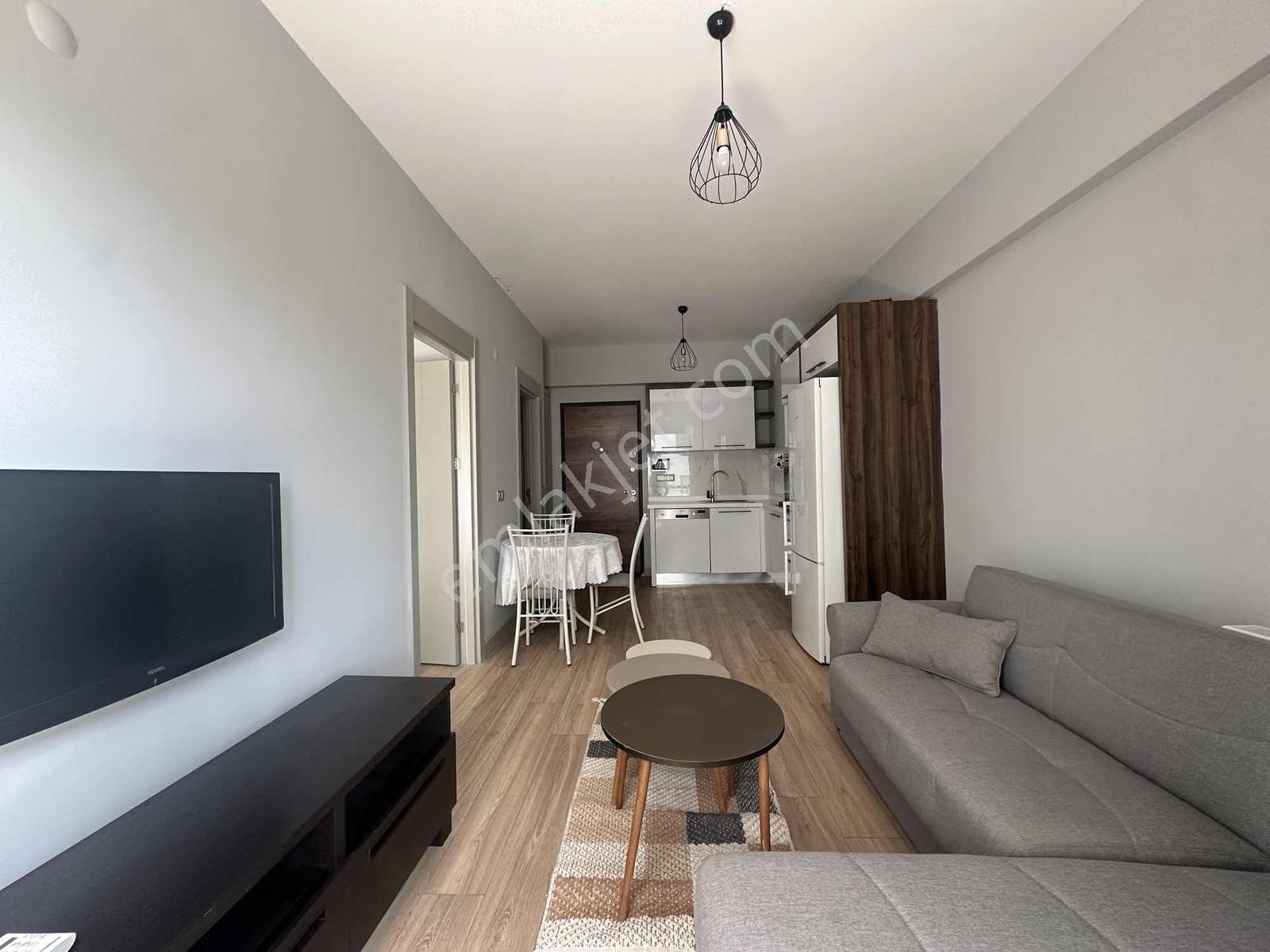 Park Yaşam Bornova'da Eşyalı Kiralık 1+1 Havuz Cephe İç Peyzaj - Görsel 13