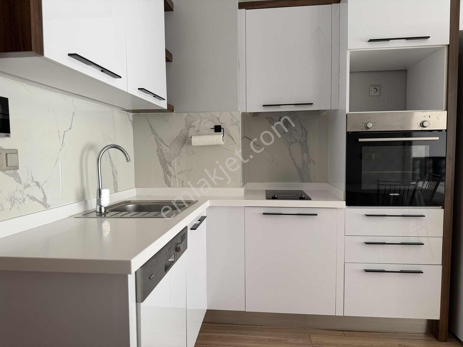 Park Yaşam Bornova'da Eşyalı Kiralık 1+1 Havuz Cephe İç Peyzaj - Görsel 25