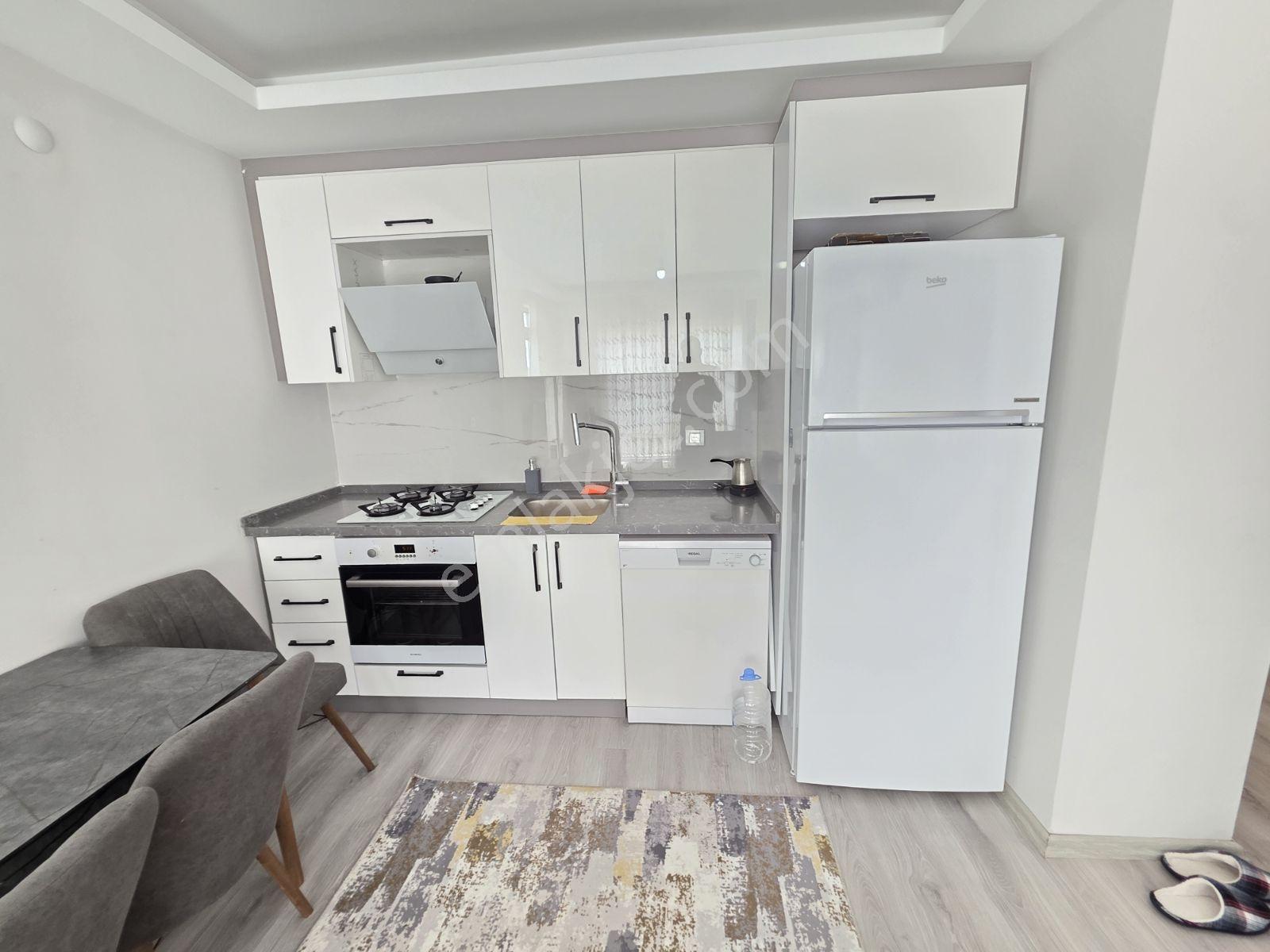 Eşyalı 1+1 / Havuz Manzaralı / Ara Kat / Güneydoğu Cepheli - Görsel 26