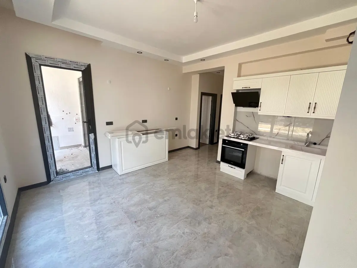 Güre Çamlıbelde Bahçe Kullanımlı Havuzlu Satılık 1+1 Daire - 11