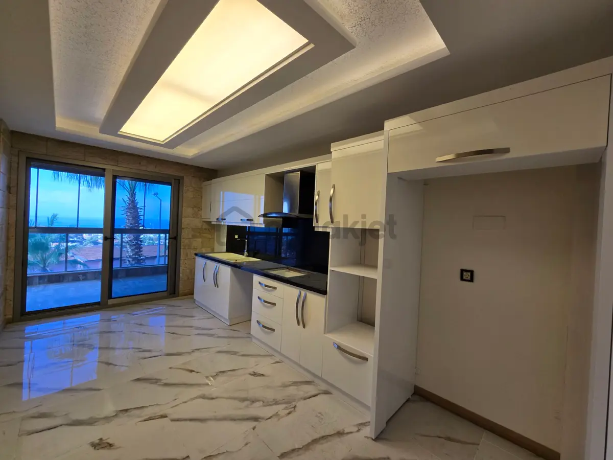 Kuşadasında Açık Kapalı Yüzme Havuz'lu 3+1 140m2 Deniz Manzaralı Lux Daire - 32