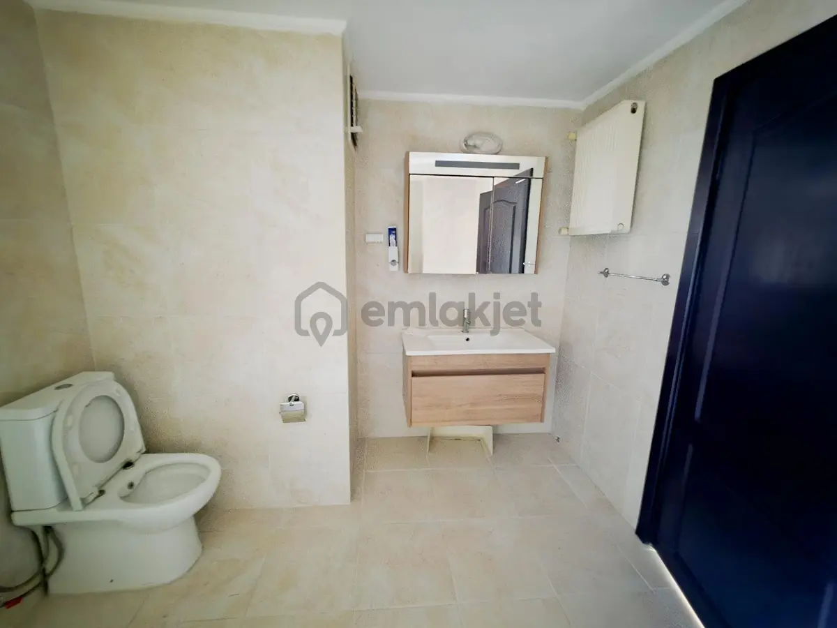 Güzelyalı'da Denize Sıfır 3+1 Asansörlü Kat Mülkiyetli Daireler - 12