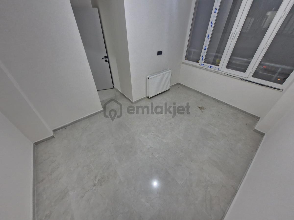 Merkezi Konumda 1+1 Sıfır Kullanışlı Satılık Daire - 15