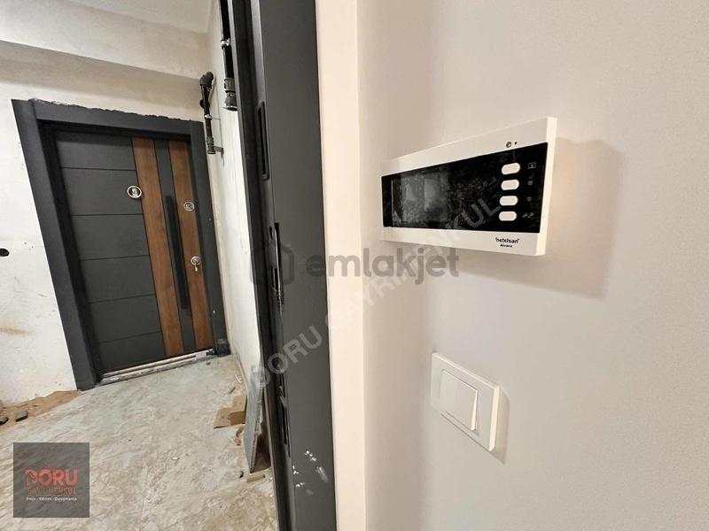 Doru'dan Tekzen Civarı Ana Cadde Satılık Sıfır 2+1 Daire - 12