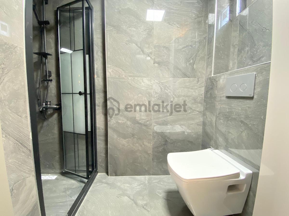 Alaçatı'dan İncek'te Lüks Ara Katta Yerden Isıtmalı 2+1 Daire - 26