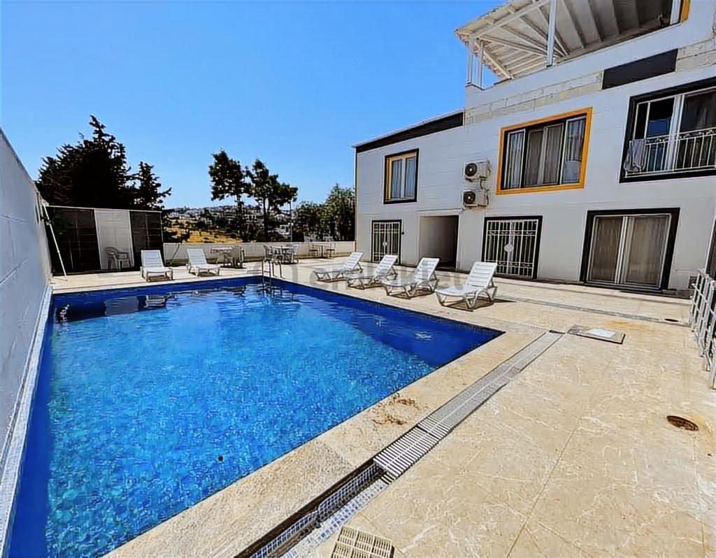 Bodrum Eskiçeşme'de Satılık Havuzlu Lüks 1+1 Daire
