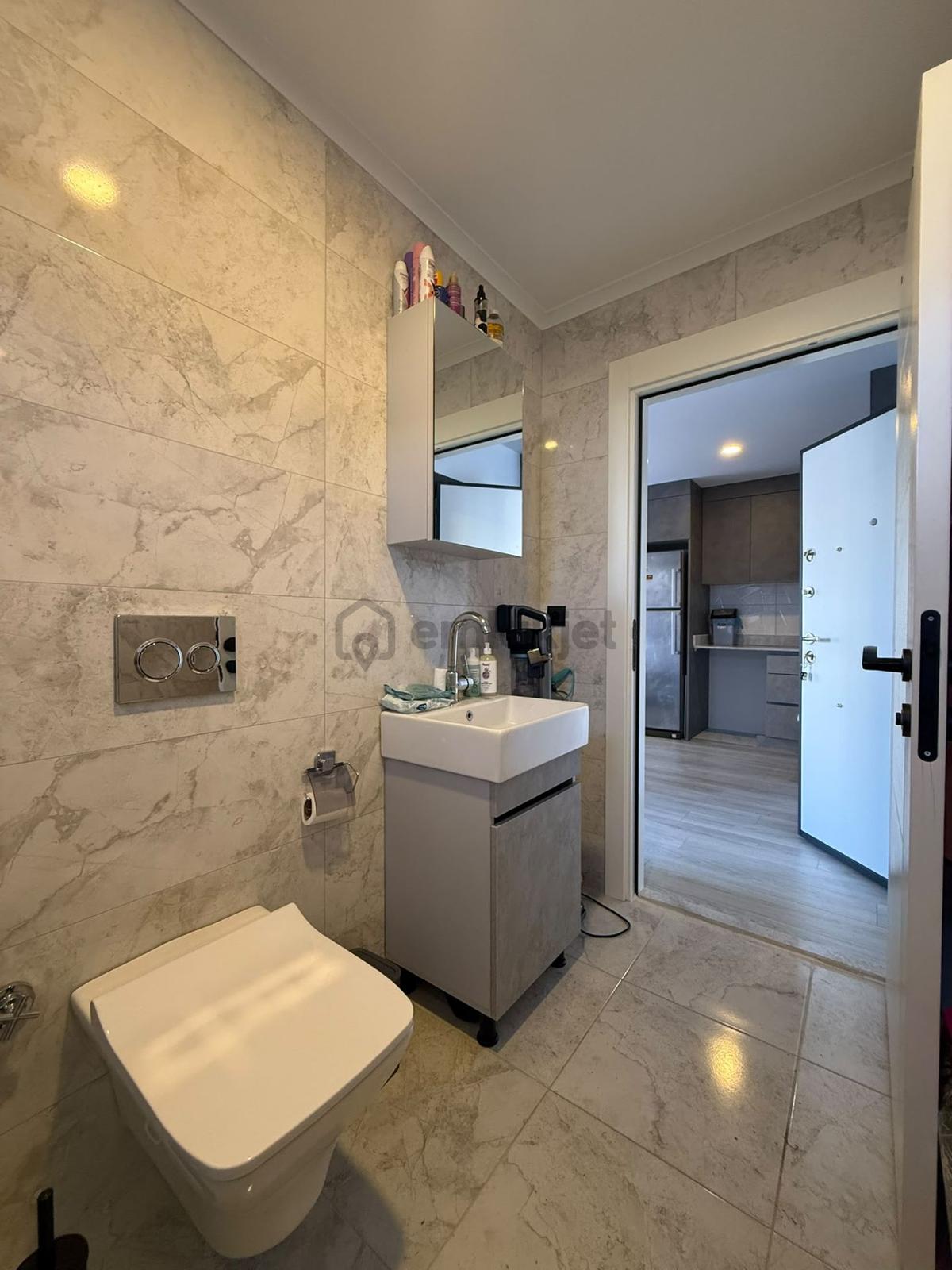 Kepez Aydoğmuş'da Yeni Apt.'da Yüksek Giriş 1+1 Daire - 24