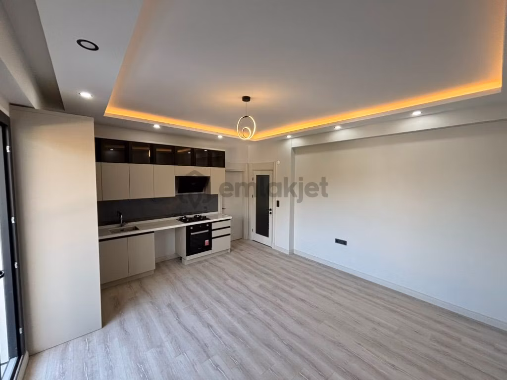 Güre Merkez’de Satılık Kapalı Otoparklı 1+1 Darie