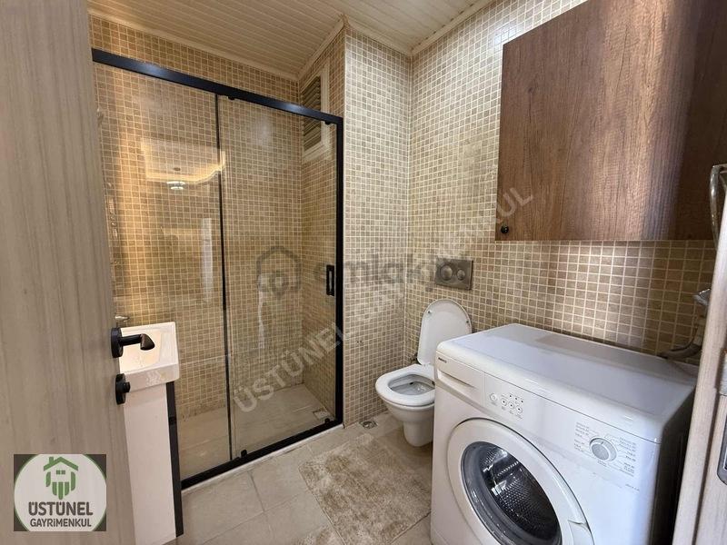Üstünel'den Havuzlu Site İçerisinde Şehir Manzaralı 2+1 Daire - 24