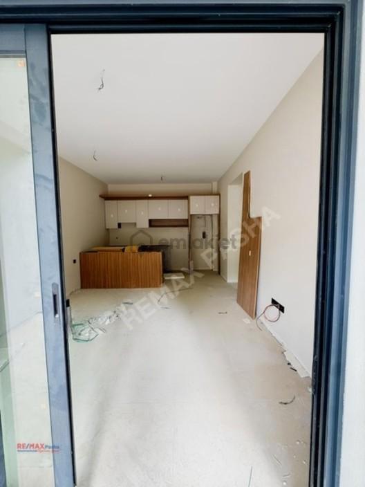 Kuşadası Davutlar'da Yatay Mimari 1+1 Satılık Daire - 12