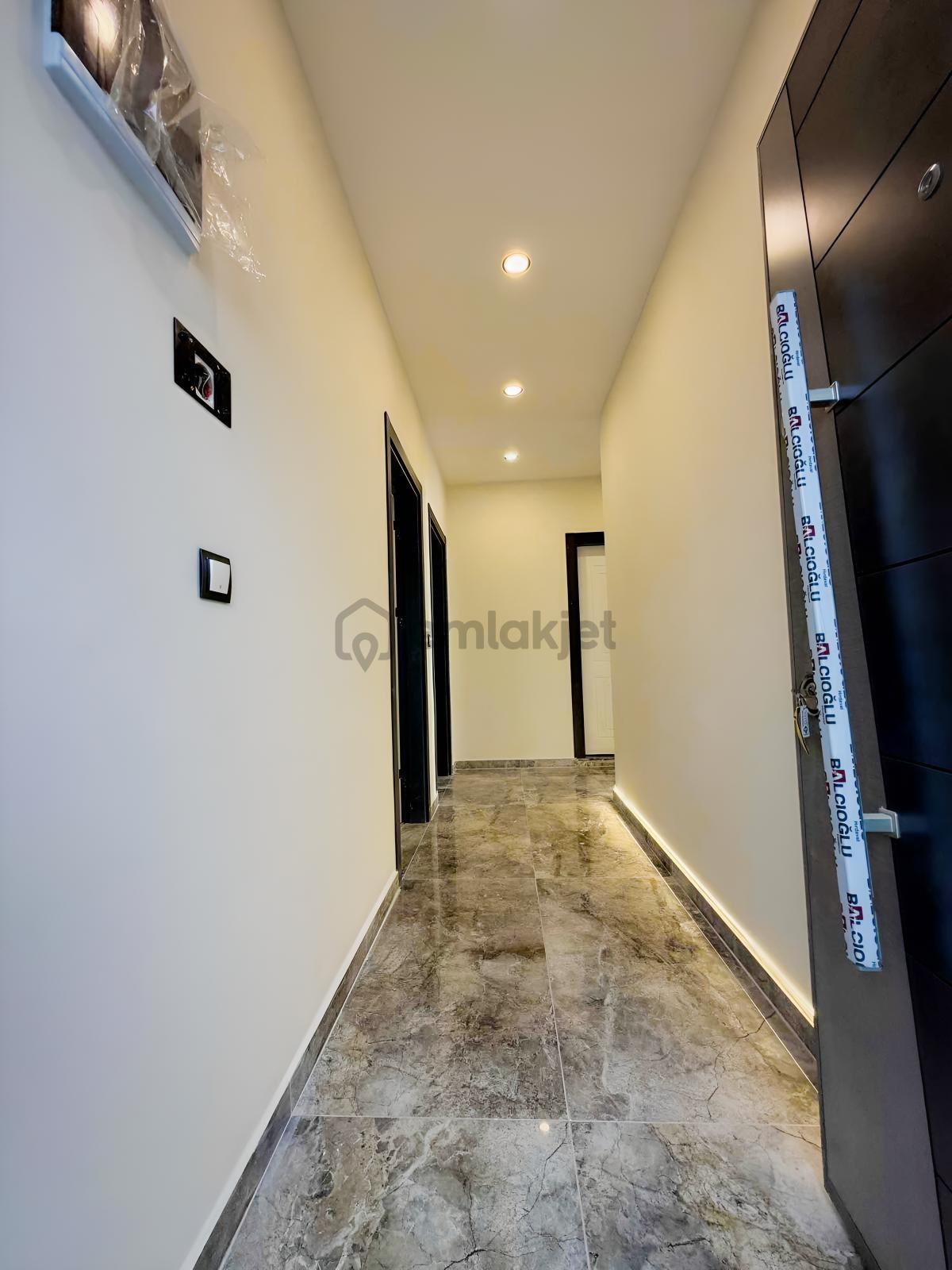 Hsn Emlk'tan Güzelçamlı'da Satılık Sıfır Daire - 2