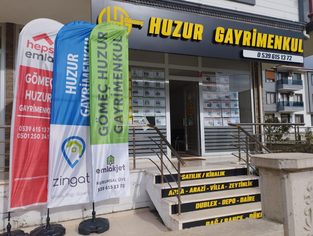Emre  Tura logo