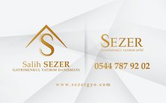 Sezer Emlak Logo