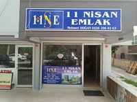 11 NİSAN EMLAK Logo