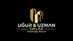 UĞUR UZMAN EMLAK KÜÇÜKYALI Logo