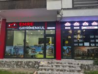 EMRE GAYRİMENKUL Logo