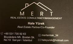 mert emlak Logo