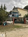 Şekercioğlu Gayrımenkul'den İmarlı Arsa İçinde Satılık Ahşap Ev