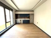 🌀gültaş Emlaktan Akçayda Satılık Modern Yaşam Sunan 1+1 Asansörlü Daire