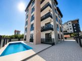 Döşemealtı Yeniköy'de Havuzlu 1+1 Sıfır Eşyalı Lüks Kiralık Daire