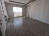 Atıcı'dan Belediyenin Yanında Kiralık Kombili 2+1 Daire.