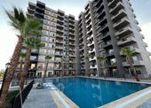 Karınca'dan Çeşmeli'de Giyinme Odalı Havuzlu 1+1 Köşe Daire !!