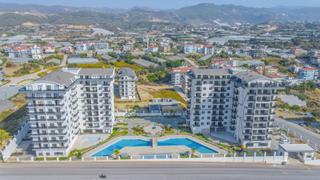 Fiyat Düştü! Alanya Payallar'da Satılık Full Aktiviteli Deniz Manzaralı 2+1 Daire