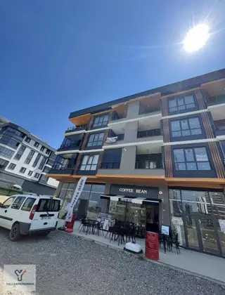Yalı Gayrimenkul|gökdelenler Bölgesi Deniz Manzaralı Fırsat 1+1