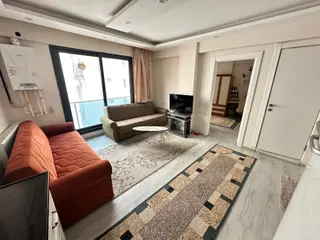 Zeki Emlak'tan Manisa Muradiye'de Eşyalı Satılık 1+1 Ara Kat Daire