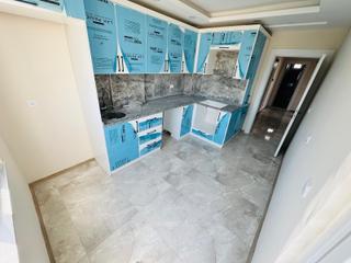 Aydoğmuşta Ulaşım Yakını İskanlı Asansörlü Ara Kat 2+1