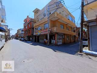Meydan Caddesi Üzeri Köşe Başı 2/adet İş Yeri 2/adet Daire