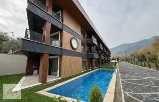 Arya'dan Güre'de 3+1 Bahçe Kullanımlı Kazdağları Manzaralı Daire
