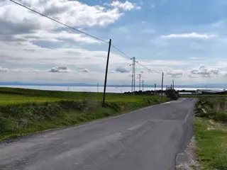 Bulut Yatırımdan 4215 M² Merkeze Yakın Resmi Yolu Olan Deniz Manzaralı Tarla