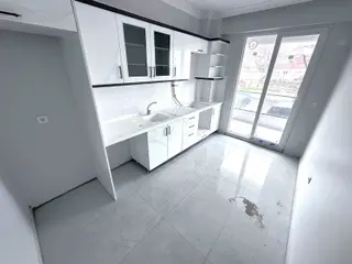 𝄞melodi'den Gömeç Mithatpaşa'da Ayrı Mutfaklı Ön Cephe Yerden Isıtmalı Yepyeni 2+1 Daire