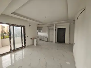 Karınca'dan Davultepe'de Site İçi Merkezi Konumda 2+1 Satılık