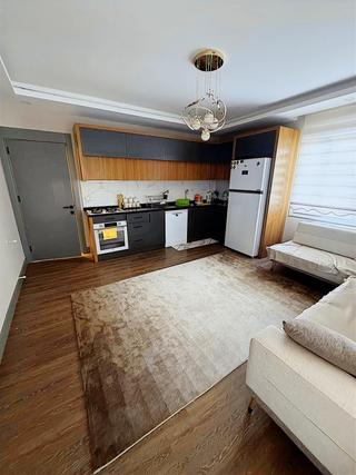 Atabey'den Kocahasanlıda Fuul Eşyalı Daire 2+1 Denize Yakın