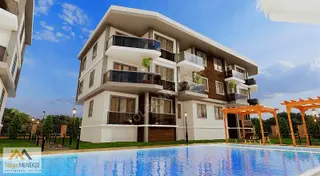 Kumbağ'da Havuzlu Sitede Denize 500m Çift Balkonlu Ultra Lüx 2+1 Kumbağ'da Havuzlu Sitede Denize 500m Çift Balkonlu Ultra Lüx 2+1