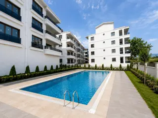 Gürsoy'dan İkizçayda Kapalı Otopark Yüzme Havuzlu Full Kredi 1+1