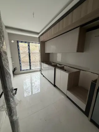Vatan Emlak'tan Karakaya'da Giriş Konumlu Bahçe Kullanımlı Sıfır Bina İçerisinde Lüks Yapılı 2+1