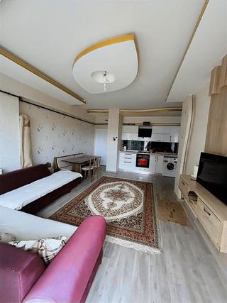 Sürer Emlak'tan Satılık Ful Eşyalı 1+1 Daire`miz Ara Katta